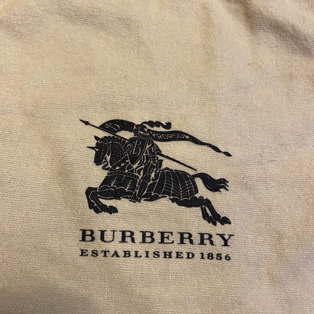 Gold Burberry wristlet bag, with a dust bag